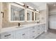 Double vanity bathroom with modern fixtures and LED lighting at 8509 S 10Th Ln # 23, Phoenix, AZ 85041