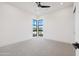 Spacious bedroom with plush carpeting and large windows at 8509 S 10Th Ln # 23, Phoenix, AZ 85041
