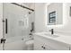 Clean bathroom with a shower/tub combo and floating vanity at 8509 S 10Th Ln # 23, Phoenix, AZ 85041