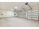 Two-car garage with automatic door openers and ample space at 8509 S 10Th Ln # 23, Phoenix, AZ 85041