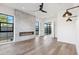Bright living room features a modern fireplace and hardwood floors at 8509 S 10Th Ln # 23, Phoenix, AZ 85041