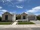 Stunning two-story home with brick exterior and landscaped yard at 5755 S Joshua Tree Ln, Gilbert, AZ 85298