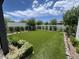 Landscaped backyard with lush green lawn at 5755 S Joshua Tree Ln, Gilbert, AZ 85298