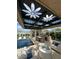 Relaxing poolside patio with seating and a covered structure at 5755 S Joshua Tree Ln, Gilbert, AZ 85298