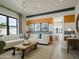 Spacious living room with sectional sofa and wood accent table at 5755 S Joshua Tree Ln, Gilbert, AZ 85298