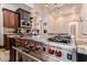 Upscale kitchen features granite countertops and high-end stainless steel appliances at 6215 E Turquoise Ave, Paradise Valley, AZ 85253