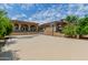 Large concrete basketball court with a hoop and surrounding landscaping at 6215 E Turquoise Ave, Paradise Valley, AZ 85253