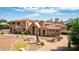 Luxury home with large yard, desert landscaping, and brick driveway at 6215 E Turquoise Ave, Paradise Valley, AZ 85253