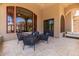 Outdoor patio with seating and large windows at 6215 E Turquoise Ave, Paradise Valley, AZ 85253