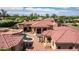 Luxury estate home with a large pool and patio area at 6215 E Turquoise Ave, Paradise Valley, AZ 85253