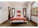 Bedroom with a king-size bed and natural light at 6215 E Turquoise Ave, Paradise Valley, AZ 85253