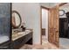 Elegant bathroom with granite vanity, large mirror, and spacious layout at 6215 E Turquoise Ave, Paradise Valley, AZ 85253