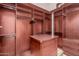 Large walk-in closet with ample shelving and hanging space at 6215 E Turquoise Ave, Paradise Valley, AZ 85253