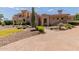 Stunning two-story home with a brick driveway and desert landscaping at 6215 E Turquoise Ave, Paradise Valley, AZ 85253
