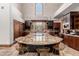 Large kitchen island with granite countertop and high-end appliances at 6215 E Turquoise Ave, Paradise Valley, AZ 85253