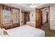 Bright bedroom with a queen-size bed and ensuite bathroom at 6215 E Turquoise Ave, Paradise Valley, AZ 85253