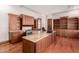 Spacious home office with built-in cabinetry and granite countertops at 6215 E Turquoise Ave, Paradise Valley, AZ 85253