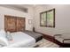 Comfortable bedroom with closet and chair at 6215 E Turquoise Ave, Paradise Valley, AZ 85253
