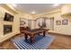 Basement game room with pool table and fireplace at 6215 E Turquoise Ave, Paradise Valley, AZ 85253