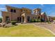 Luxury two-story home with a beautifully landscaped front yard at 6215 E Turquoise Ave, Paradise Valley, AZ 85253
