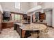 Spacious kitchen with large island and high ceilings at 6215 E Turquoise Ave, Paradise Valley, AZ 85253