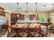 Island kitchen with granite countertops and dark wood cabinetry at 20371 E Calle De Flores --, Queen Creek, AZ 85142