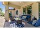 Relaxing patio with outdoor seating and a geometric rug at 20371 E Calle De Flores --, Queen Creek, AZ 85142