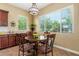 Kitchen breakfast nook with round table and four chairs at 20371 E Calle De Flores --, Queen Creek, AZ 85142