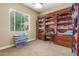 Home office with built-in shelves and a work desk at 20371 E Calle De Flores --, Queen Creek, AZ 85142