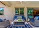 Covered patio with seating area and pool view at 20371 E Calle De Flores --, Queen Creek, AZ 85142