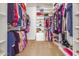 Large walk-in closet with ample shelving and hanging space at 20371 E Calle De Flores --, Queen Creek, AZ 85142