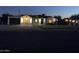 Updated home exterior at night, showcasing curb appeal at 2303 W Marshall Ave, Phoenix, AZ 85015