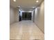 Large dining room with tile floor and built-in grill at 2303 W Marshall Ave, Phoenix, AZ 85015