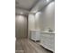 Bathroom with double vanity and white cabinets at 2303 W Marshall Ave, Phoenix, AZ 85015