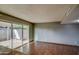 Bright dining room with hardwood floors and access to a patio at 4443 W Solano S Dr, Glendale, AZ 85301