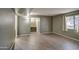 Spacious bedroom with tile floors and access to a bathroom at 4443 W Solano S Dr, Glendale, AZ 85301