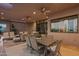 Covered patio with dining table and chairs, offering scenic views at 41915 N 111Th Pl, Scottsdale, AZ 85262