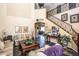 Open living room with high ceilings, staircase, and tiled floors at 16612 N 151St Ln, Surprise, AZ 85374