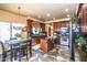 Island kitchen with granite countertops and breakfast nook at 16612 N 151St Ln, Surprise, AZ 85374