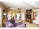 Open living area with a comfortable couch and built-in entertainment center at 16612 N 151St Ln, Surprise, AZ 85374