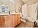 Clean bathroom with a shower/tub combo and wood vanity at 20100 N 78Th Pl # 3090, Scottsdale, AZ 85255