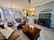 Spacious living room featuring a comfortable couch and large TV at 20100 N 78Th Pl # 3090, Scottsdale, AZ 85255