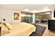 Bedroom with a queen bed and access to a private balcony at 7137 E Rancho Vista Dr # 7008, Scottsdale, AZ 85251