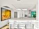 Contemporary kitchen with white cabinets and quartz countertops at 7137 E Rancho Vista Dr # 7008, Scottsdale, AZ 85251