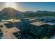 Aerial view showcasing the building's unique architecture and mountain backdrop at 7137 E Rancho Vista Dr # 7008, Scottsdale, AZ 85251