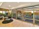 Spacious living area with floor to ceiling windows and modern chair at 7137 E Rancho Vista Dr # 7008, Scottsdale, AZ 85251