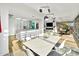 Open dining area with marble table and modern chairs at 7137 E Rancho Vista Dr # 7008, Scottsdale, AZ 85251