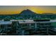 Stunning aerial view of the property at sunset with mountain views at 7137 E Rancho Vista Dr # 7008, Scottsdale, AZ 85251