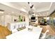 Modern kitchen with island, white cabinets, and stainless steel appliances at 7137 E Rancho Vista Dr # 7008, Scottsdale, AZ 85251
