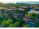 Aerial view of the building with mountain views in the background at 7137 E Rancho Vista Dr # 7008, Scottsdale, AZ 85251